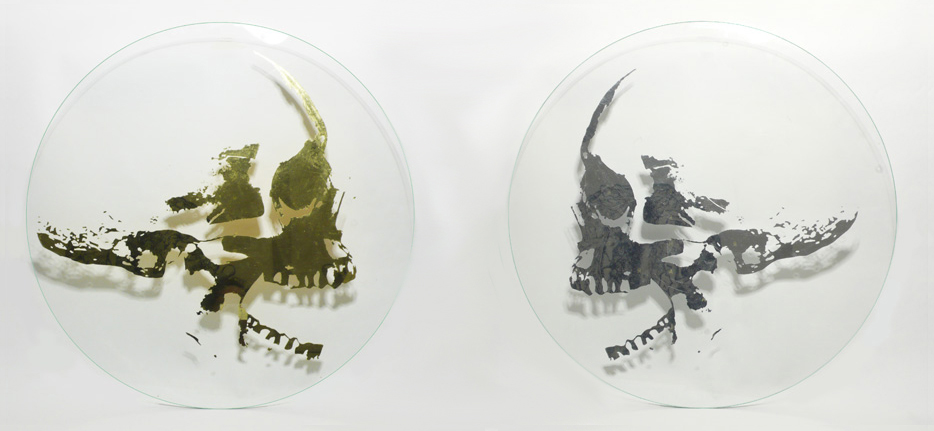 Two round glass panes with skulls