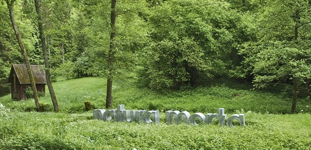 16 meters word sculpture made from perforated sheet metal