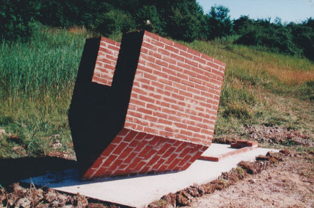 Brick house sculpture upside down